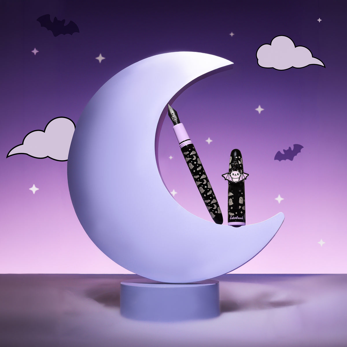 Pastel purple decorative fountain pen posed on a crescent moon stand
