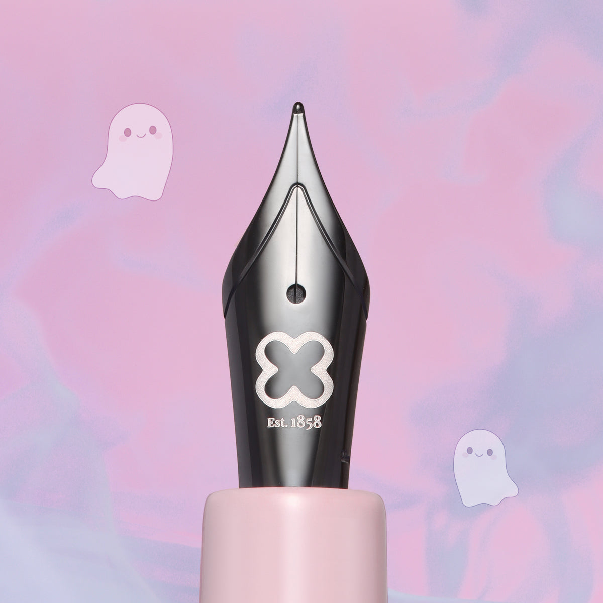 Black fountain pen with clover emblem and light pink base