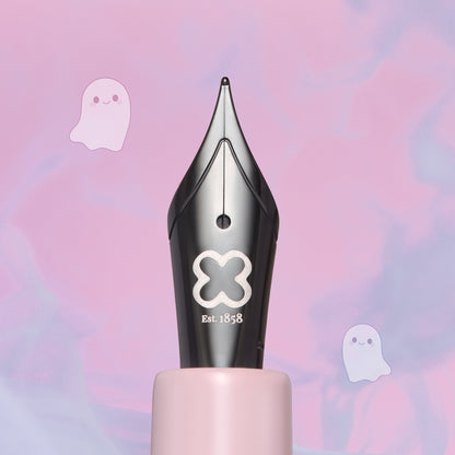 Black fountain pen with clover emblem and light pink base