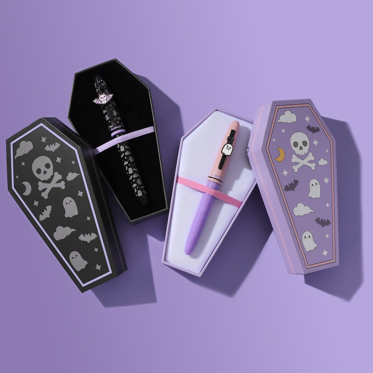 Decorative fountain pen gift set with black and pastel pens in themed boxes