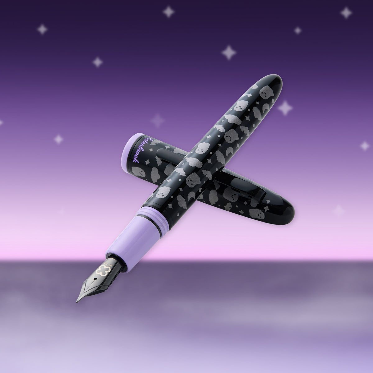 Black-and-gray ghost pattern fountain pen with silver nib, pen on display