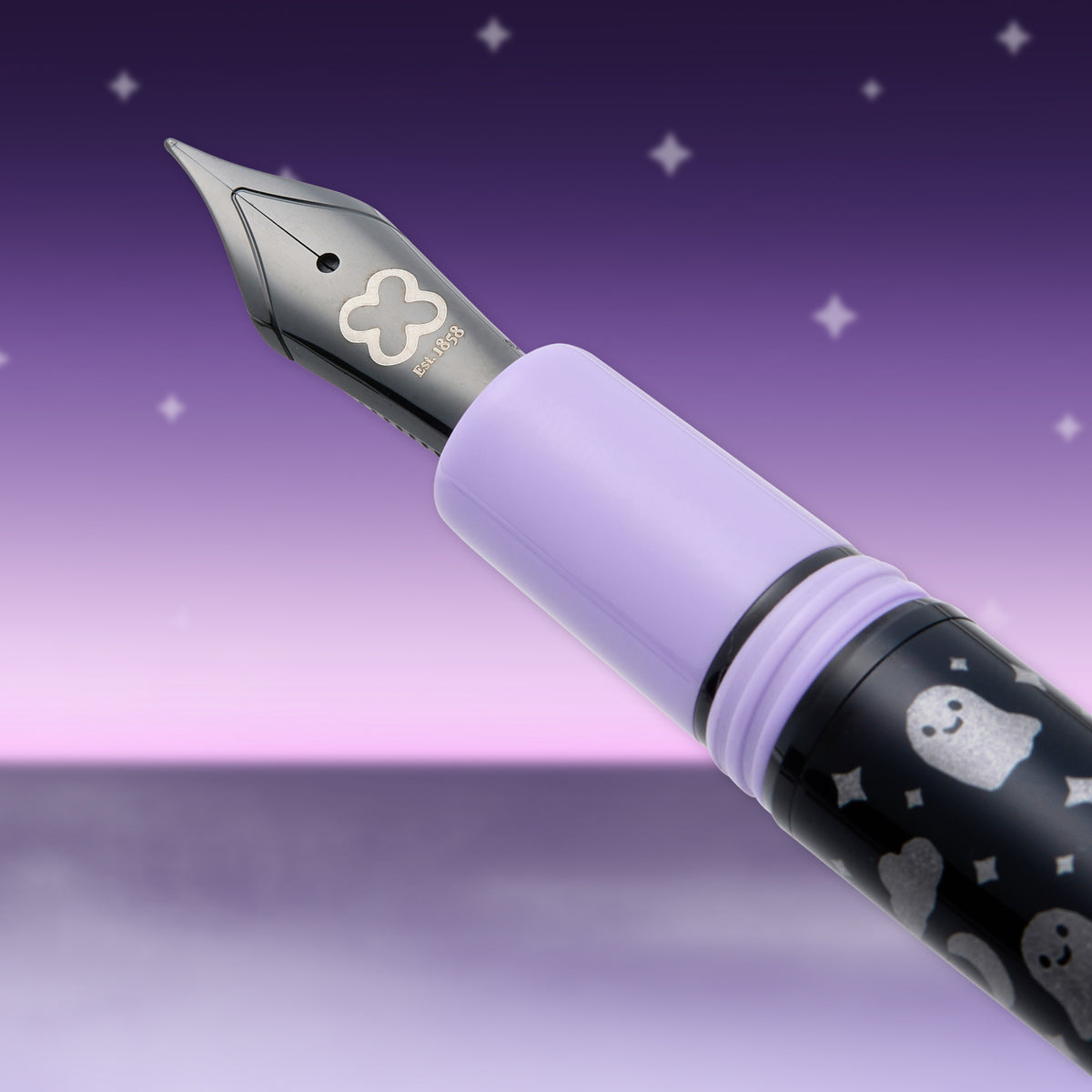 Lavender fountain pen with silver nib and black ghost pattern grip