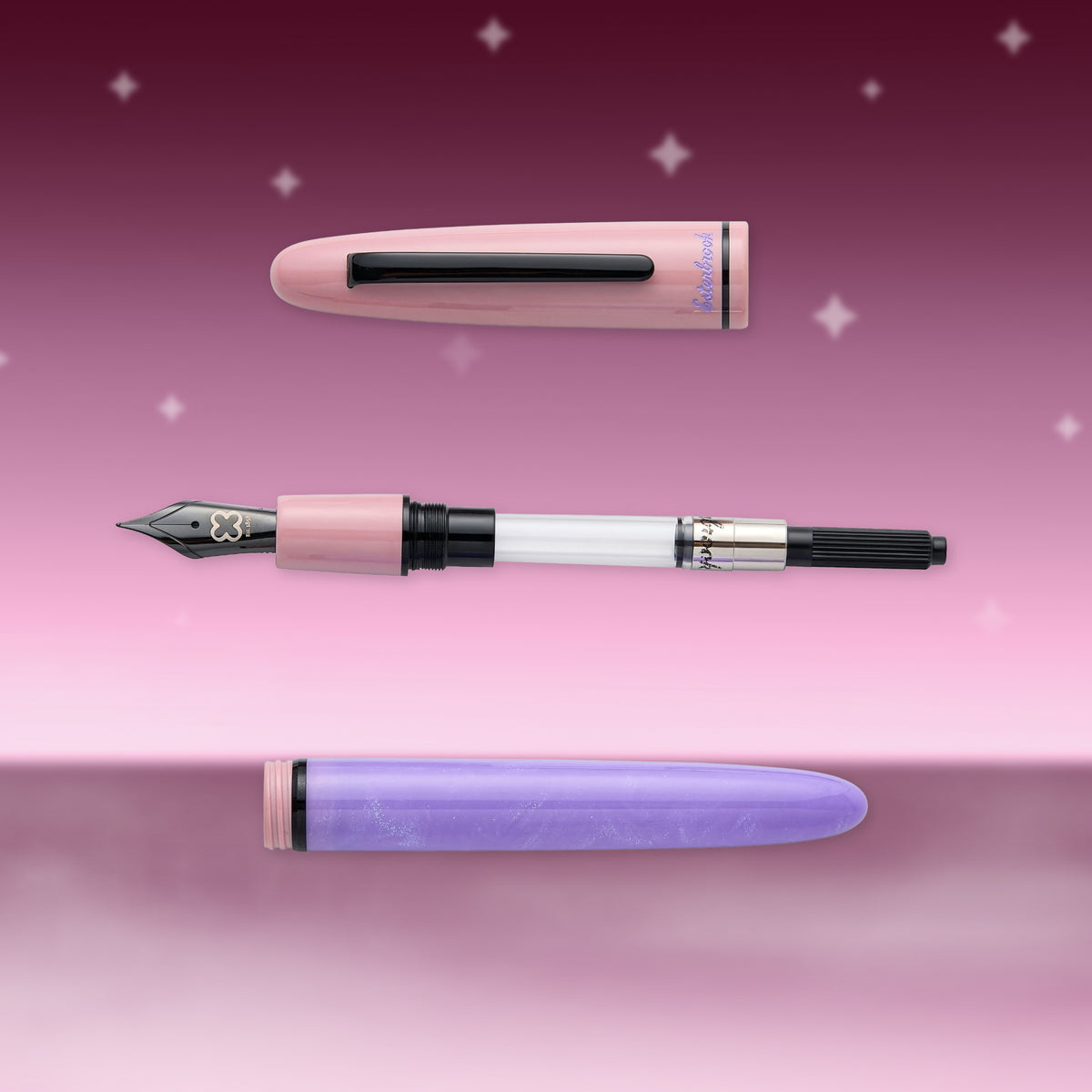 Pastel pink fountain pen with black nib and clip, single pen view