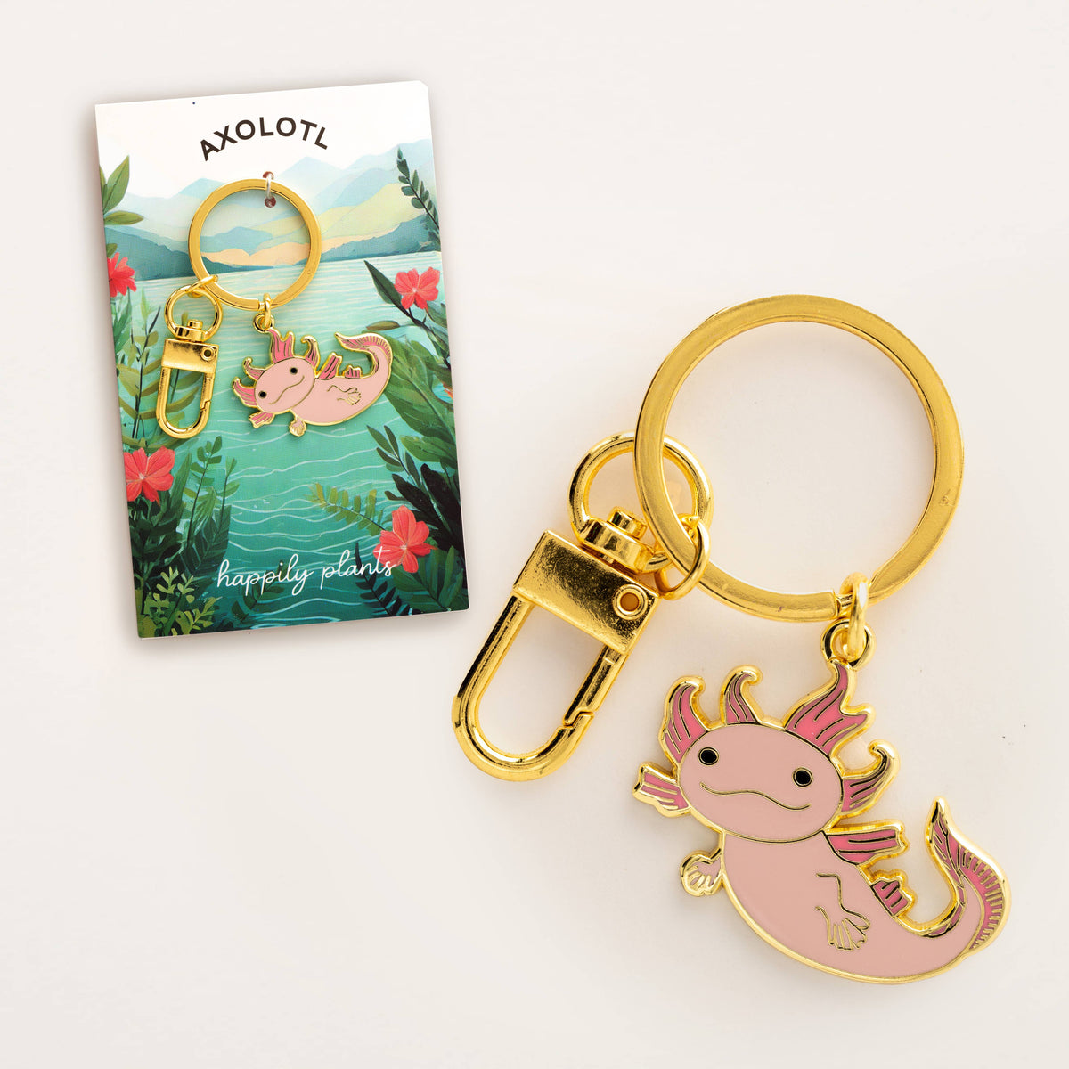Gold keyring keychain with pink axolotl enamel charm, curled tail and fins