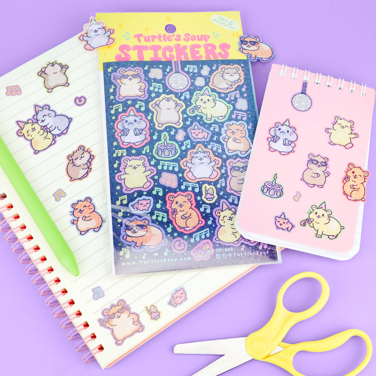 Hamster sticker sheets with matching character designs on notebooks and tags