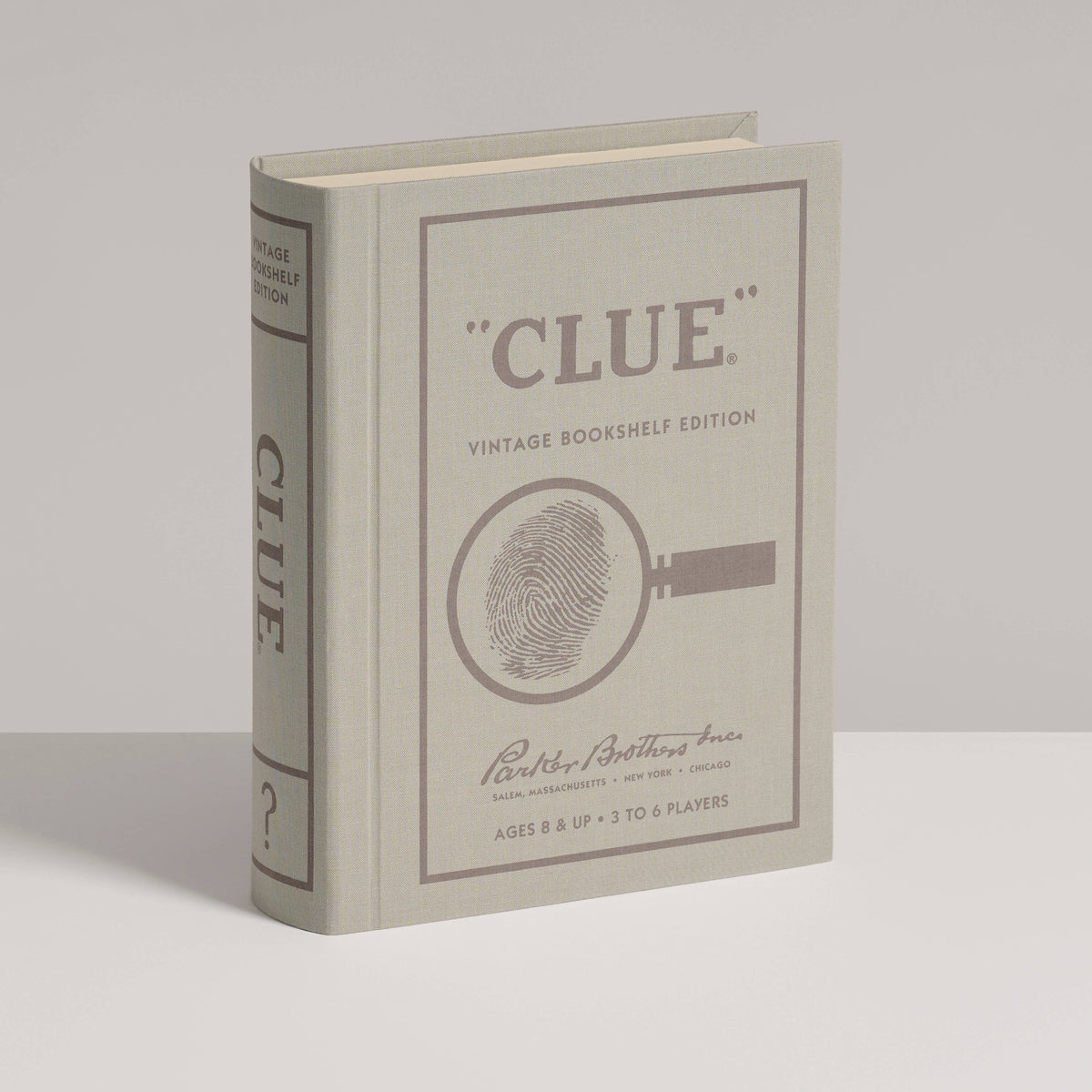 Vintage Bookshelf Edition game box with CLUE title and fingerprint-and-key emblem