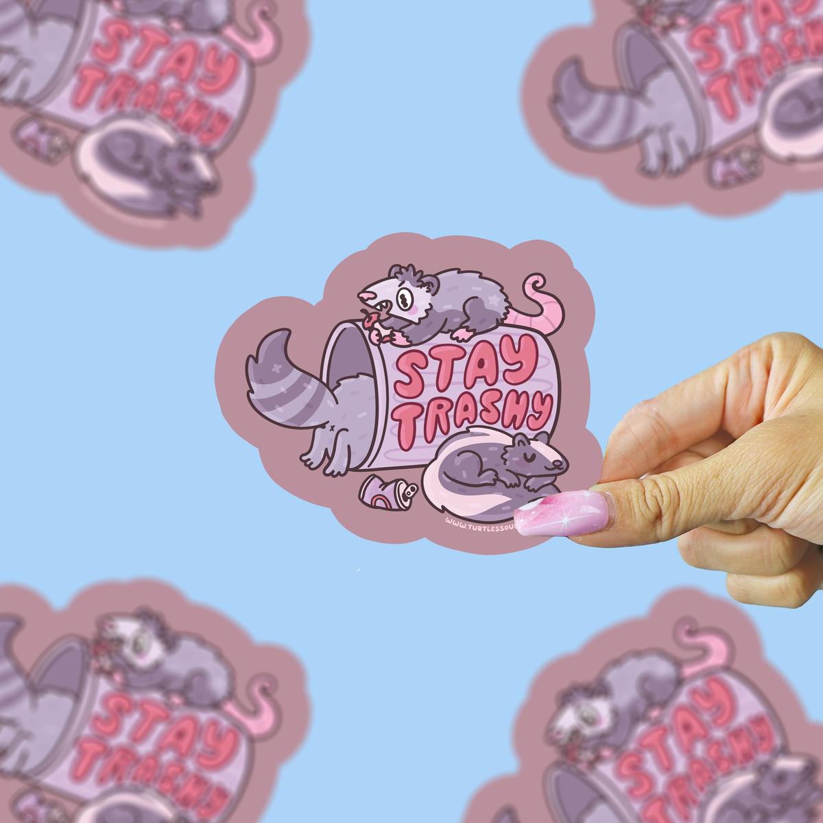 Vinyl sticker of a cute gray cat mouse character with “Stay Trashy” text
