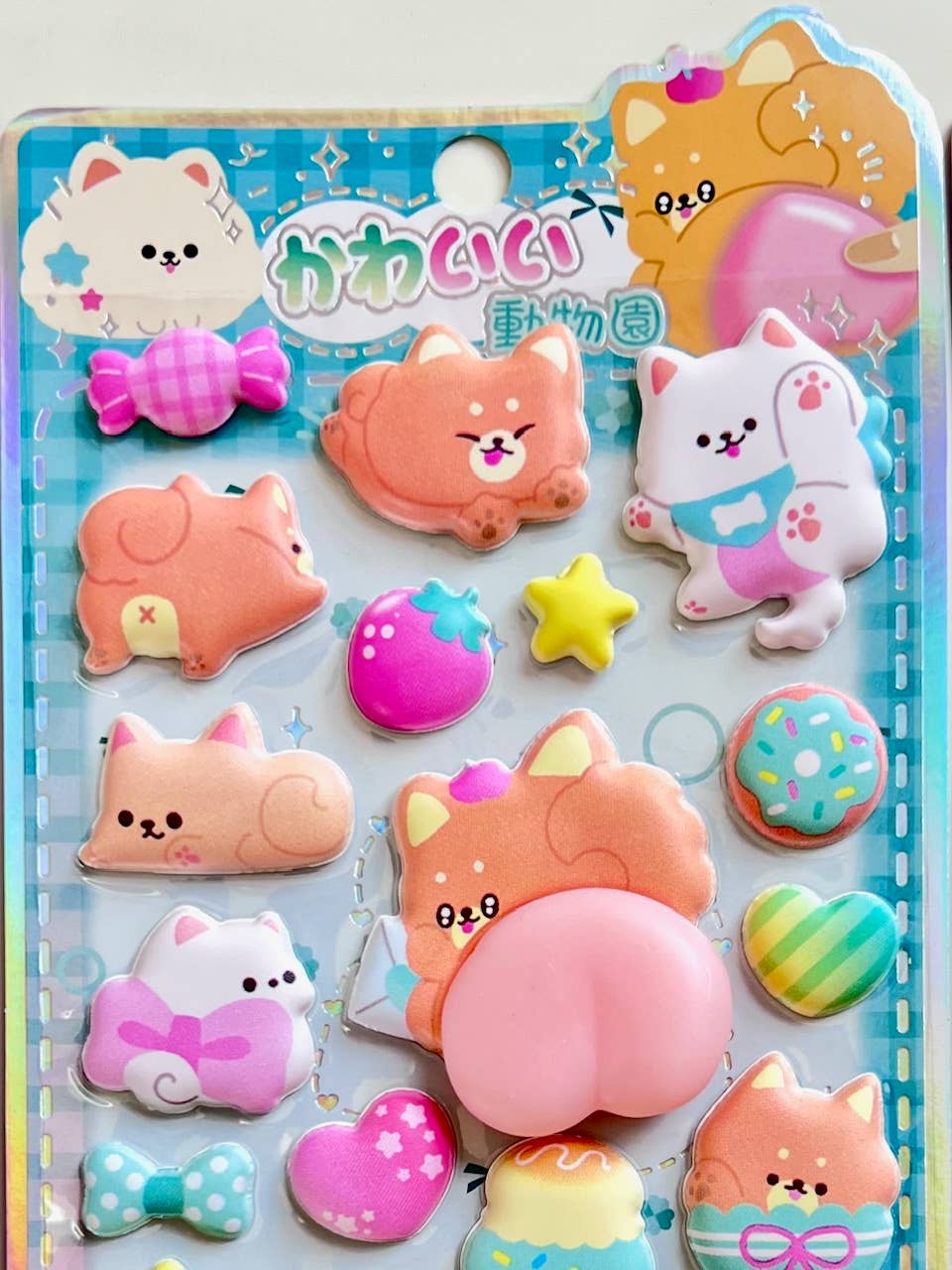 Blue animal squishy butt sticker set with pastel dogs, bears, and star accent stickers