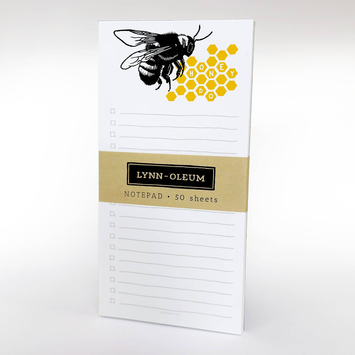 Bee notepad with honeycomb graphic, ruled lines, and 50-sheet label on cover