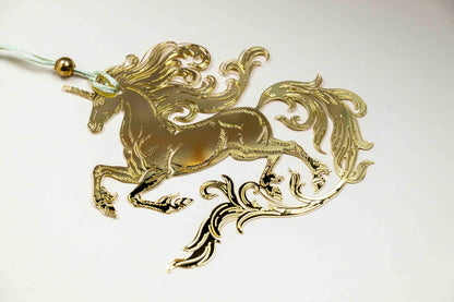 Gold unicorn bookmark charm on cord with teal tassel and small bead