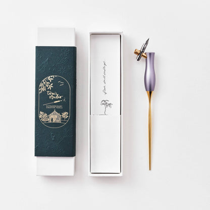 Lavender calligraphy pen with gold grip, shown with boxed presentation case