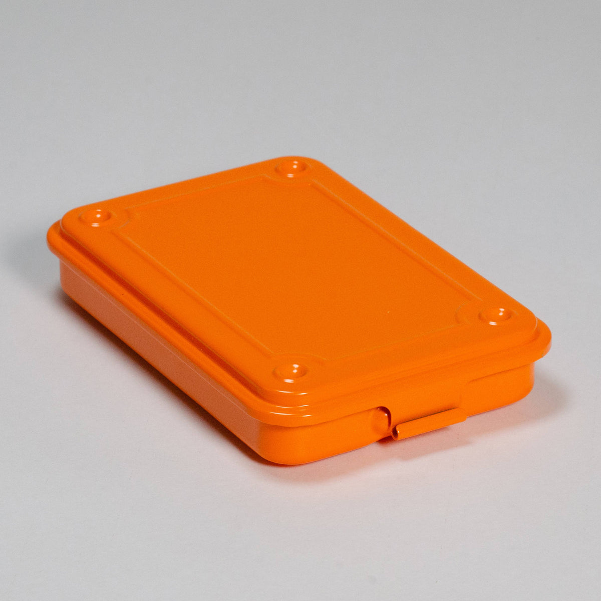 Toyo steel stackable storage box in bright orange, shown closed