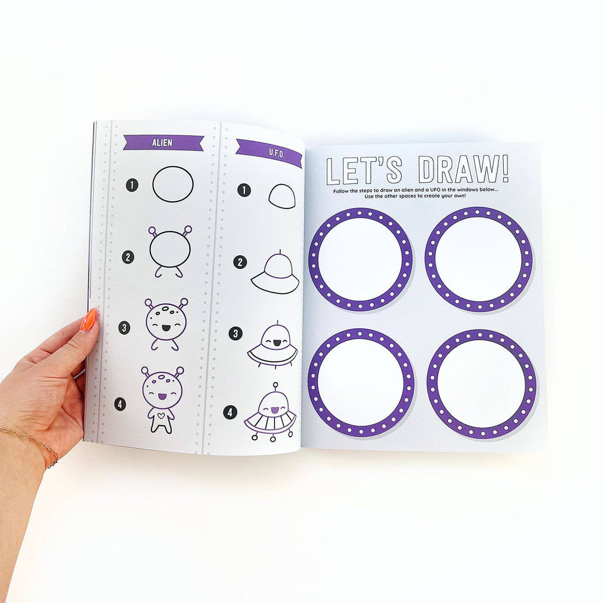 Open drawing guide page in space sticker book with alien outlines and “Let’s Draw!”
