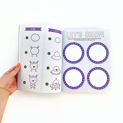 Open drawing guide page in space sticker book with alien outlines and “Let’s Draw!”