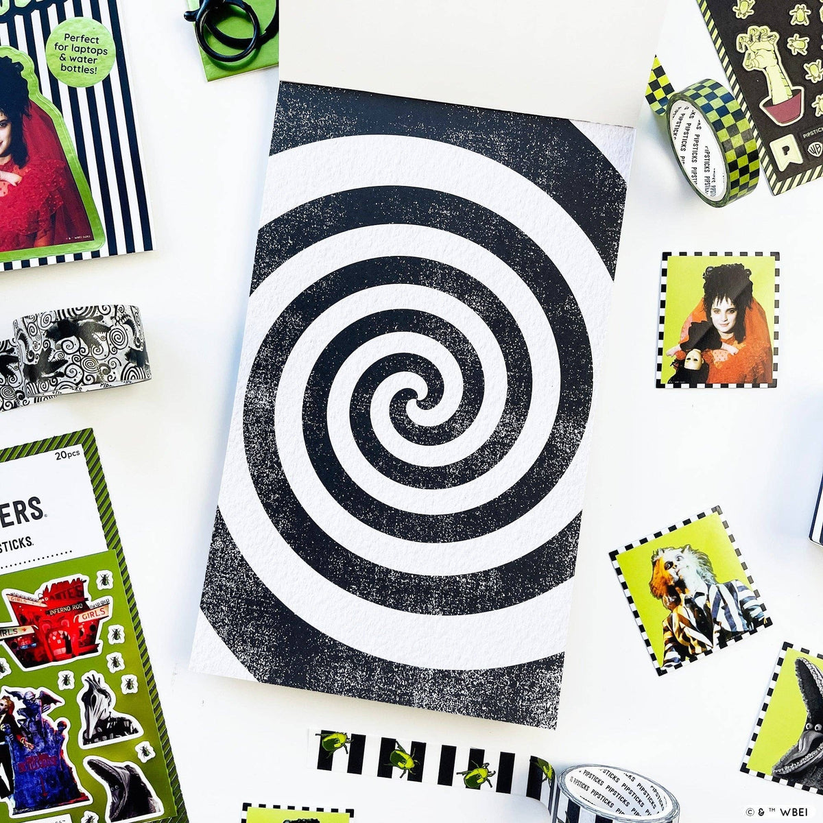 Black and white spiral target sticker sheet on white backing