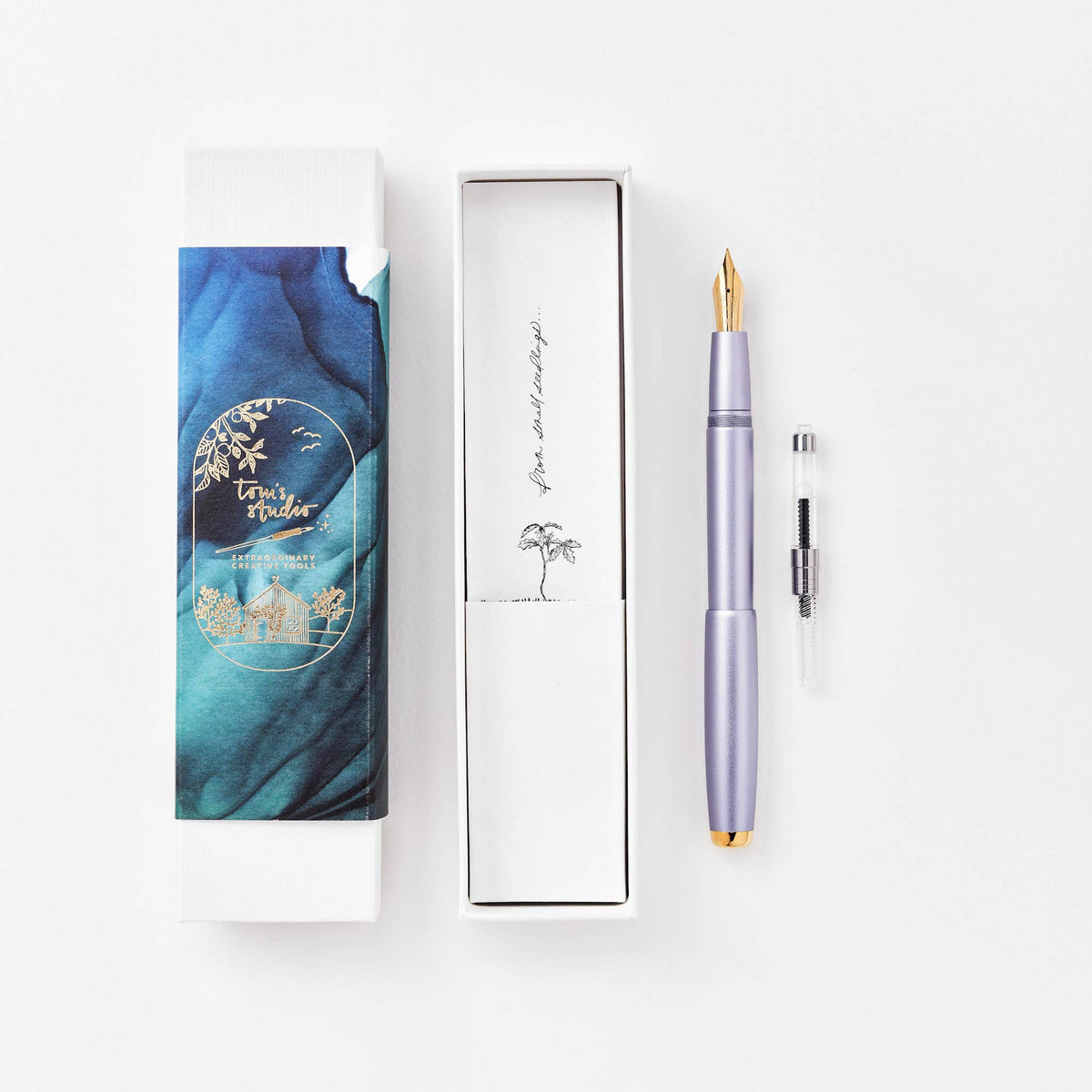 Lilac fountain pen in gift box with spare nib cartridge.
