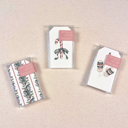 Three gift tag set packages with candy cane and holly tag designs