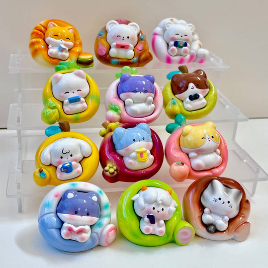 Fruit animal blind box figures set, nine colorful cute animal-to-fruit toy heads on a stand