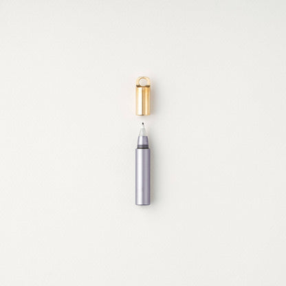Refillable travel pen, light purple barrel with gold clip and cap