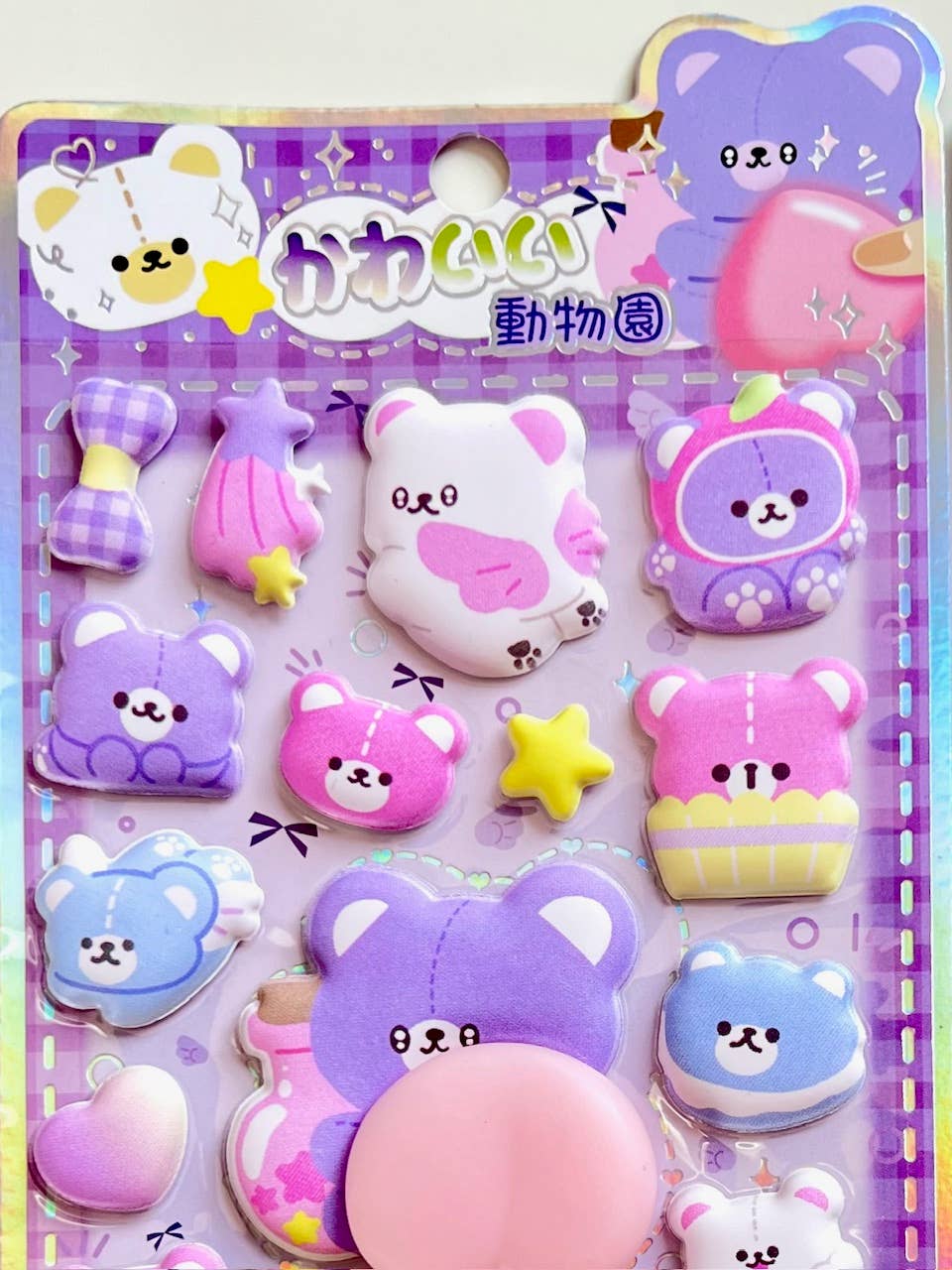 Purple animal squishy butt sticker set with bear, cat, and star-shaped charms