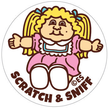 Circular Scratch & Sniff sticker showing cartoon child with curly hair and pink outfit