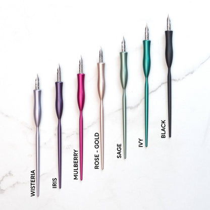 Flourish calligraphy pen set in assorted colors with gold nibs, including black