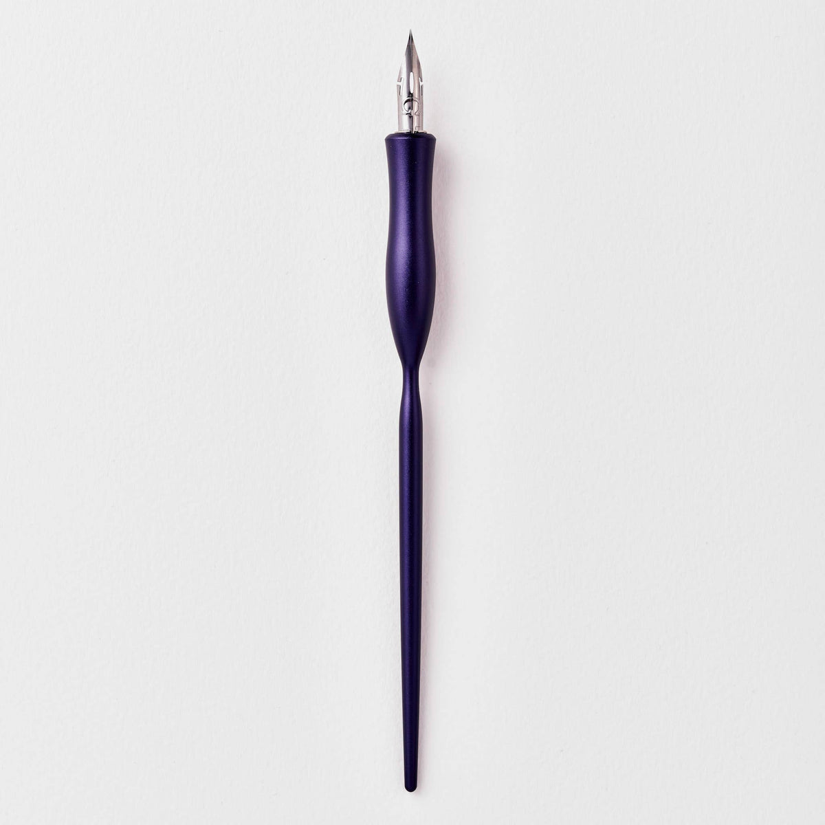 Flourish calligraphy pen with purple barrel and pointed nib