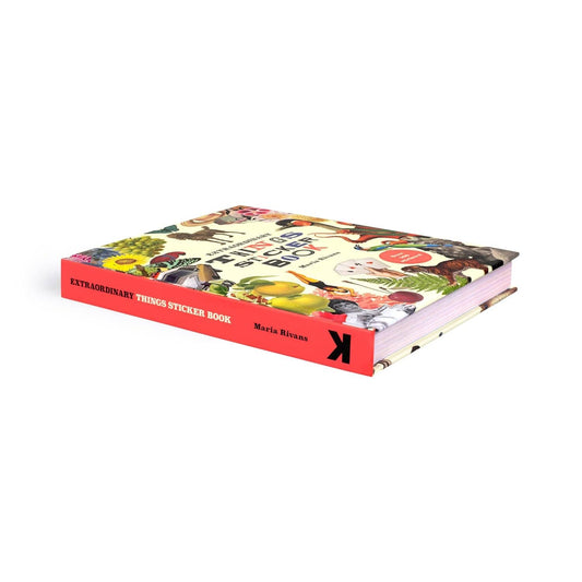 Sticker book on its side with red spine, title strip, and colorful collage cover art