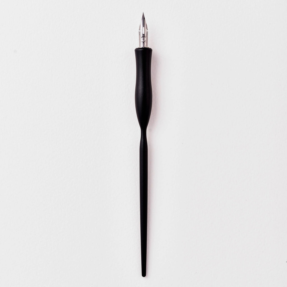 Flourish calligraphy pen with black barrel and pointed nib