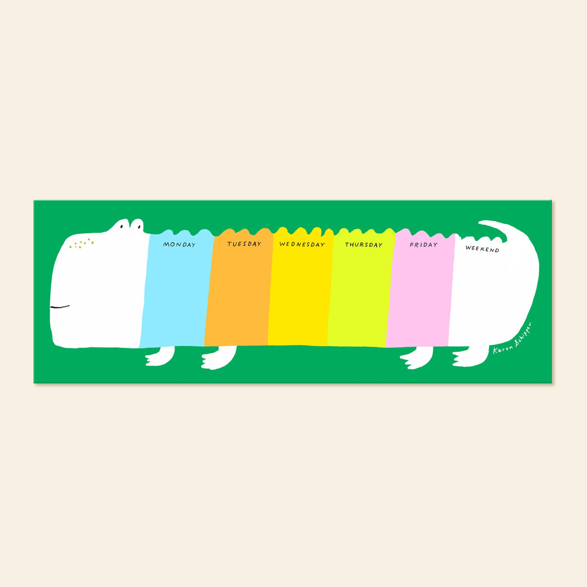 Crocodile weekly desk planner pad with Monday-to-weekend columns on a green background