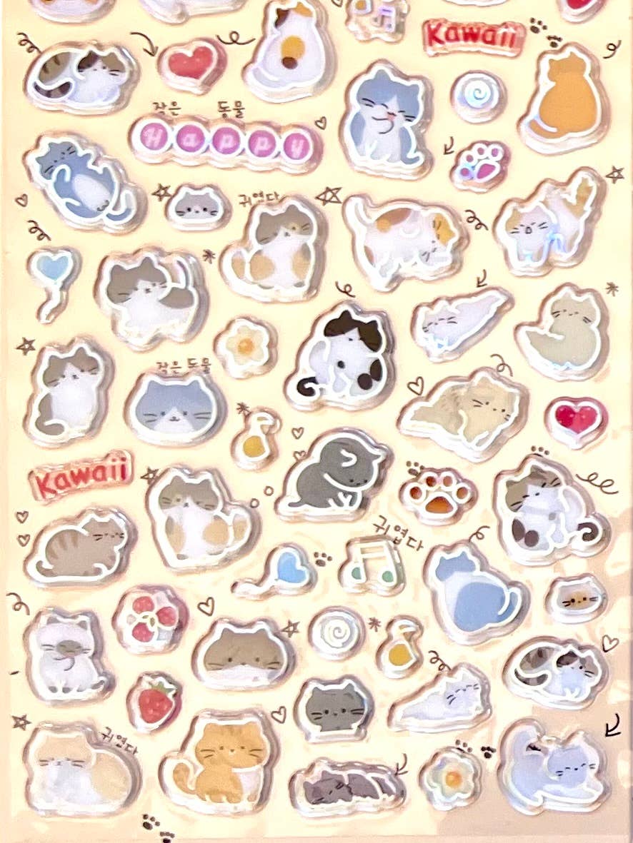 Kawaii animal sticker sheet with glossy cat and heart shapes in warm beige tones