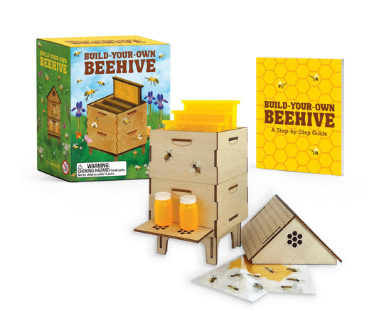 Beehive building kit with wooden hive boxes, honeycomb booklet, and step-by-step guide