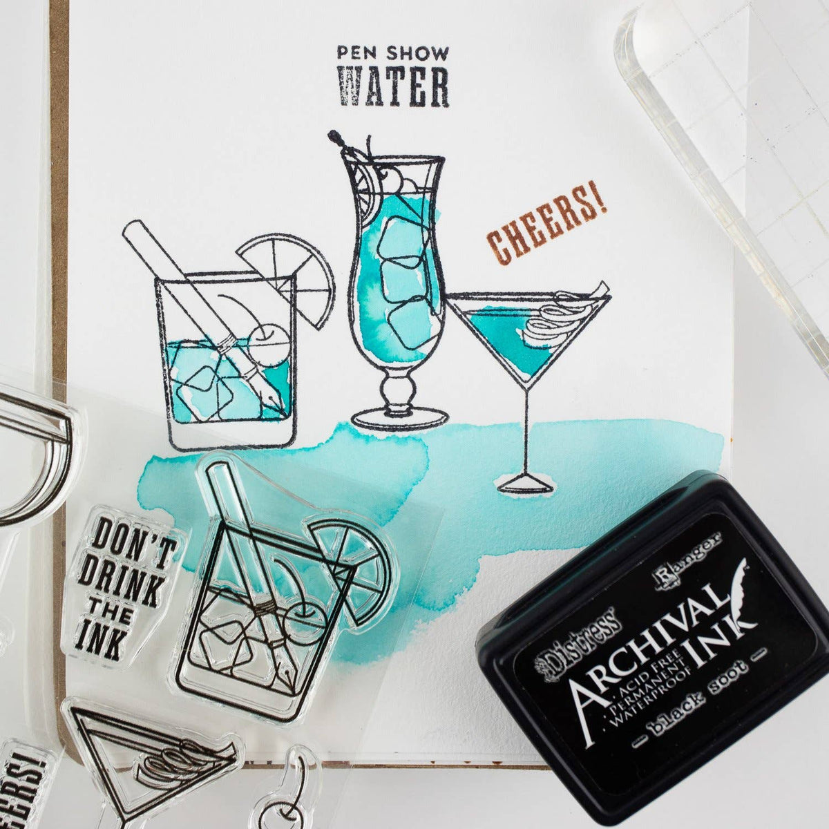 Clear stamp set stamps on paper: cocktails, Cheers! text, and Don't Drink Ink