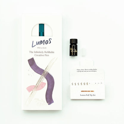 Refillable multi-tip pen set box with teal pen, gold nib, and refill tips card