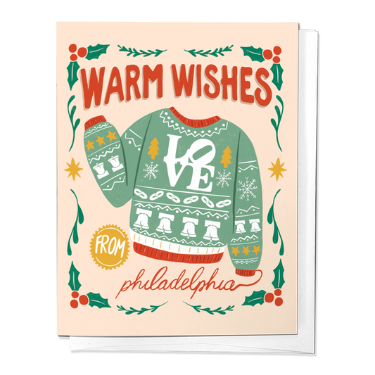 Holiday greeting card with green sweater design, “Warm Wishes” and “from philadelphia”