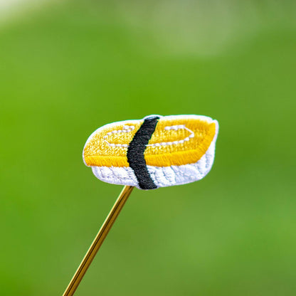 Embroidered Japanese omelette sushi iron-on patch with black seaweed strip