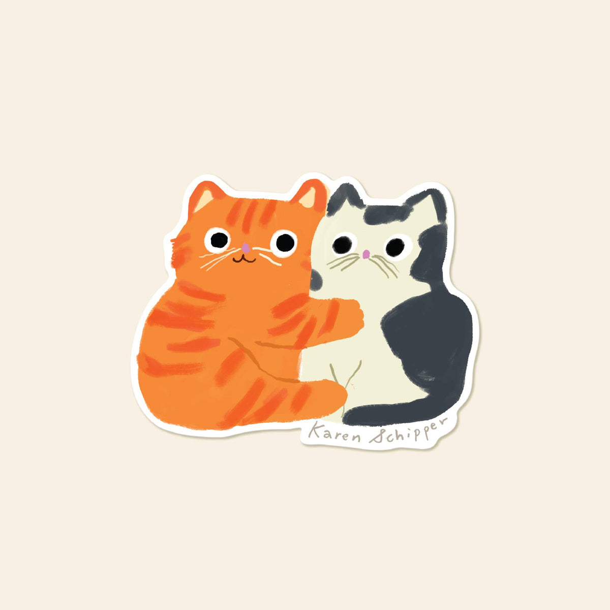 Vinyl sticker of an orange cat hugging a black and white cat