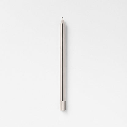 Stainless steel fountain pen, side view, with textured grip and single tip