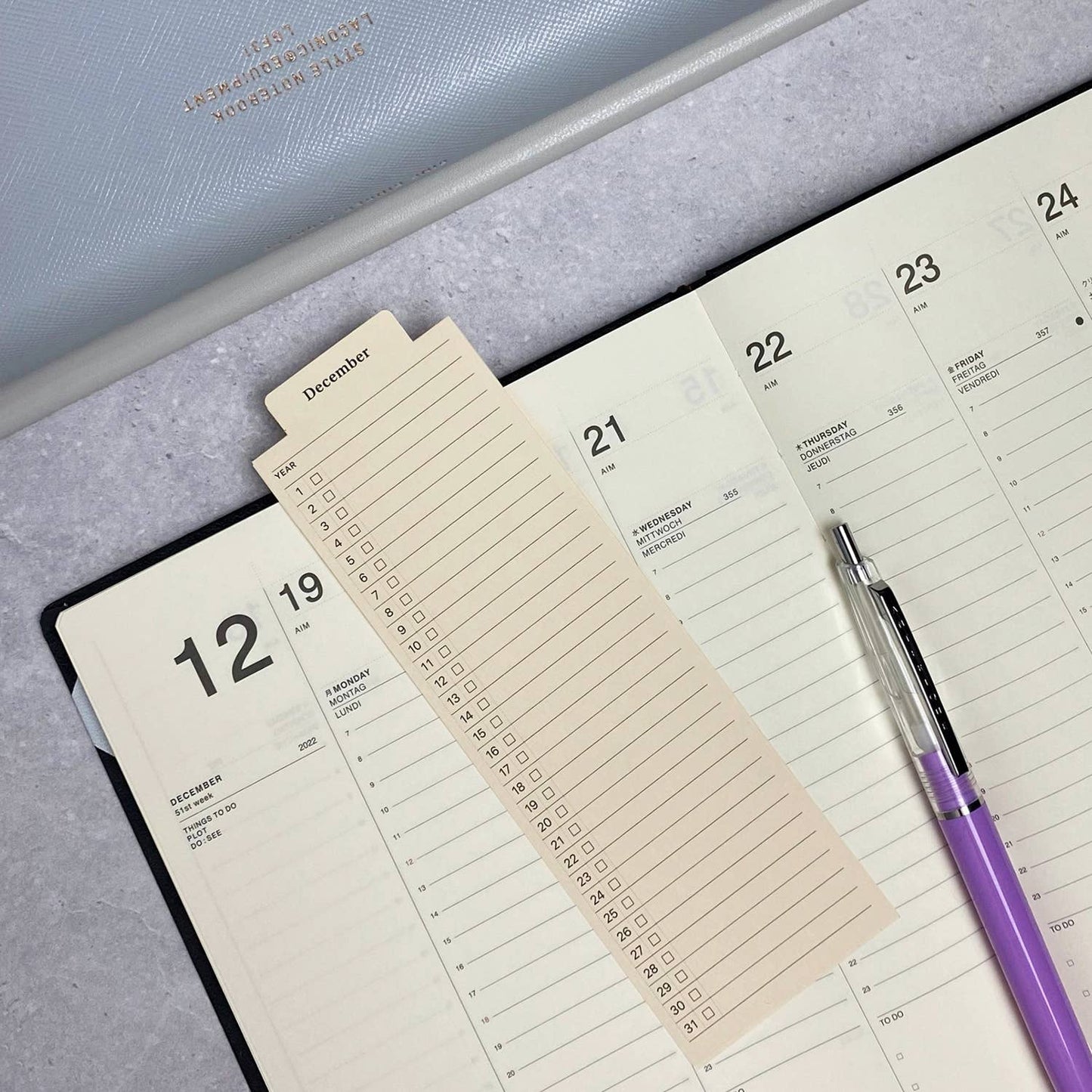 LACONIC STYLE BOOKMARKER WEEKLY