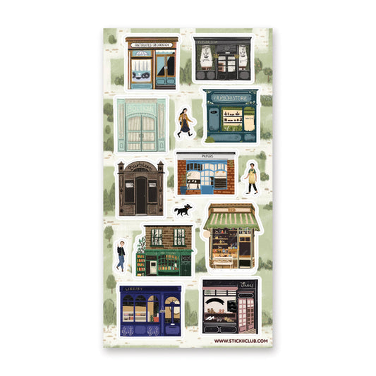 Town-themed sticker sheet with illustrated storefronts, people, and street details