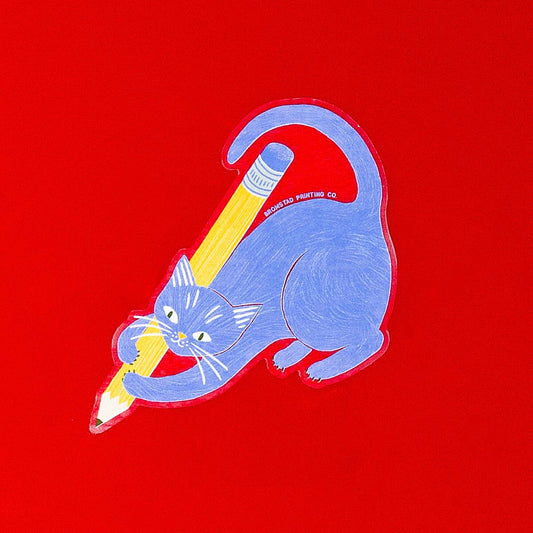 Clear sticker of a blue cat with a yellow pencil graphic