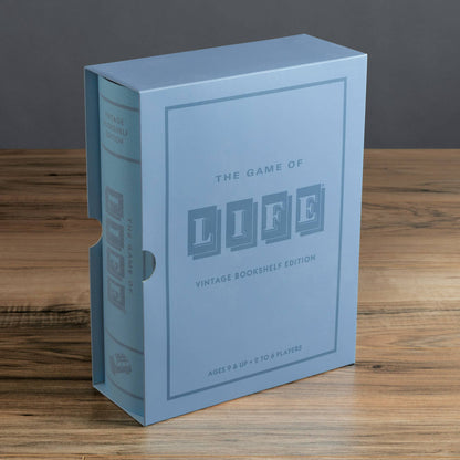 Light blue bookshelf game box with The Game of Life Life logo on front