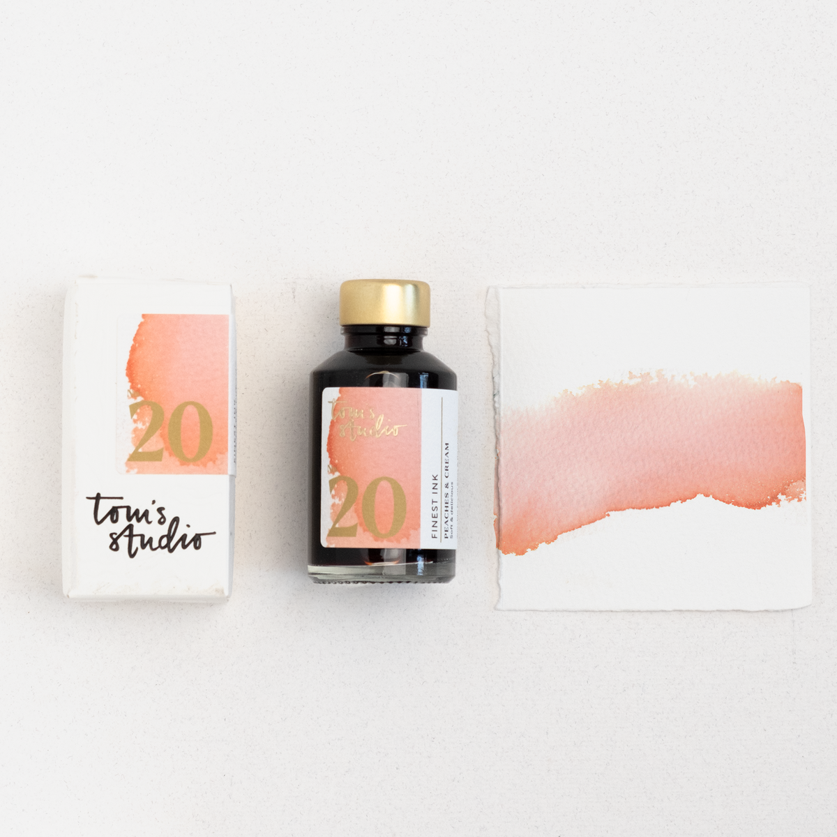 Fountain pen ink bottle with 20 Peaches & Cream, plus ink swatch cards