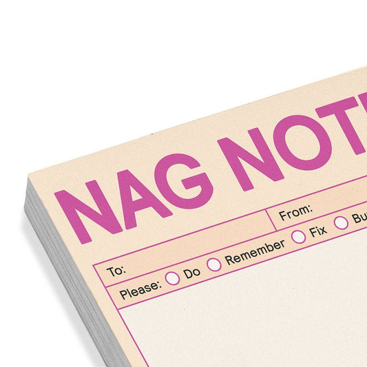 Close-up of pastel 'NAG NOTE' sticky note header and blank writing panel