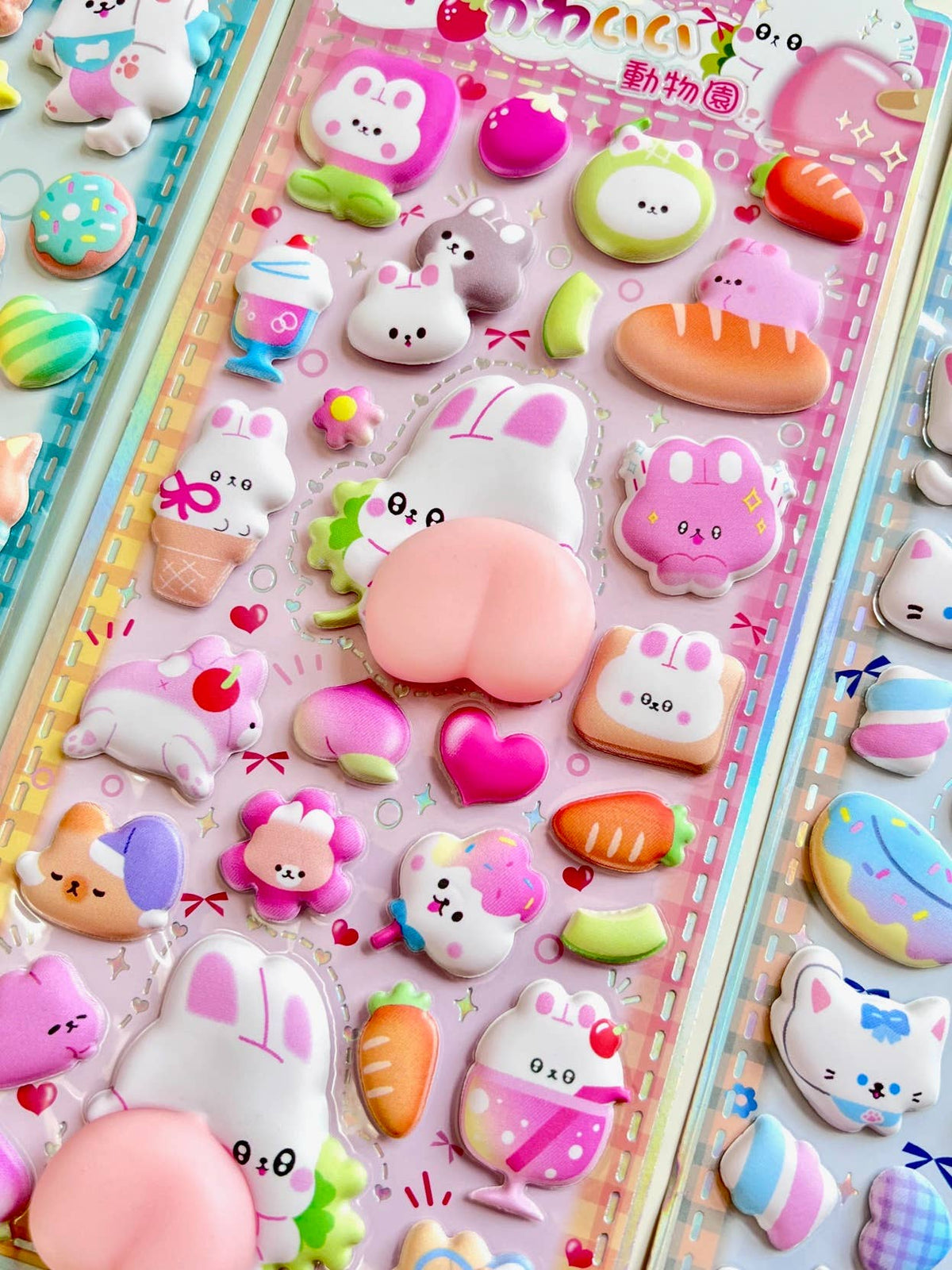 Colorful animal squishy butt sticker sheet with rabbits, cats, and heart accents