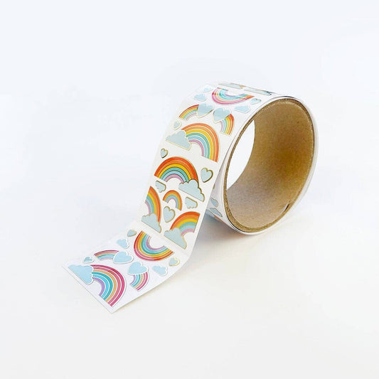 Rainbow cloud and heart sticker roll with multicolor rainbows on white backing