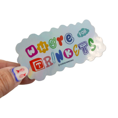 Holographic vinyl sticker with multicolor 'Whore for Trinkets' text, cloud shape