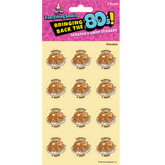 Scratch-and-sniff pancake stickers on a sheet, circular labels with 'Scratch & Sniff' text