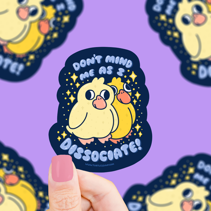 Vinyl duck sticker with “Don’t mind me as I’m disassociating?” stars and sparkles
