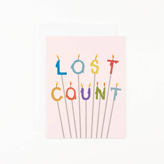 Lost Count greeting card with colorful candle letter design
